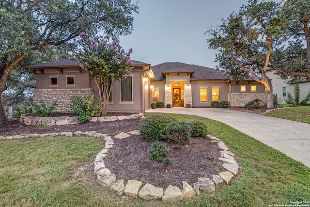 view of front of house with a yard