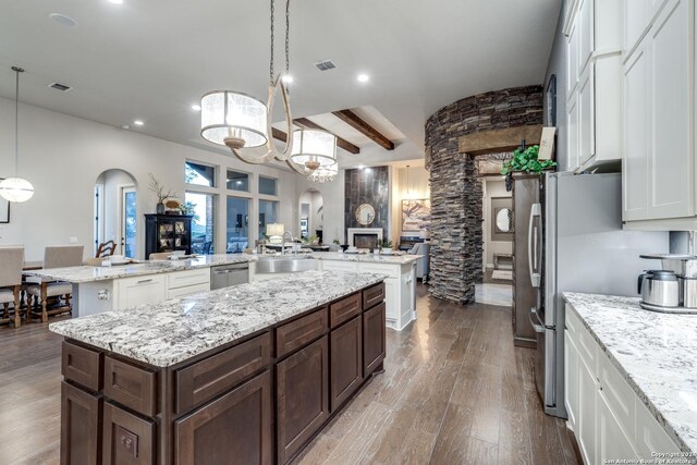 kitchen featuring white cabinets and light hardwood / wood-style floors