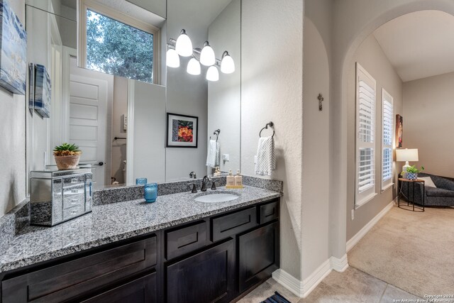 bathroom featuring tile patterned floors and vanity