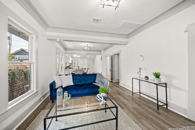 interior space with hardwood / wood-style flooring and ornamental molding