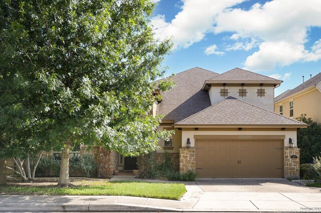 view of front of home with a garage