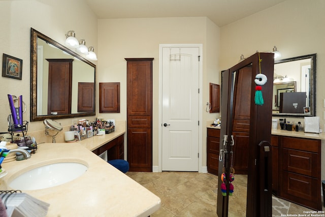 bathroom featuring tile patterned floors and vanity