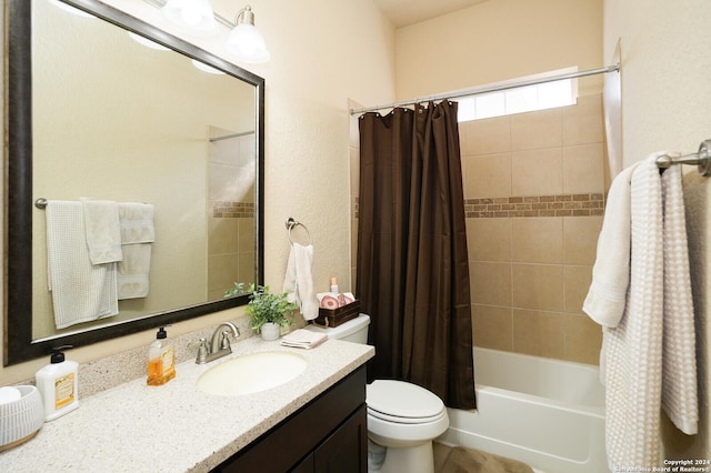 full bath with toilet, shower / bathtub combination with curtain, and vanity