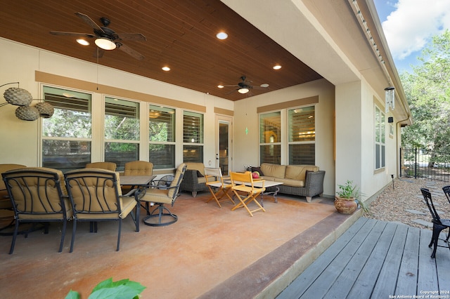 view of patio featuring ceiling fan and outdoor lounge area