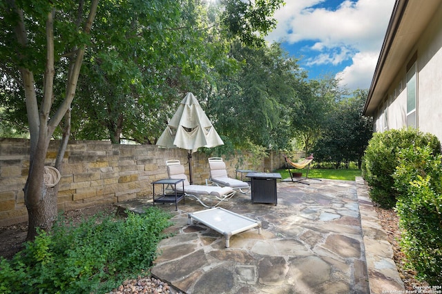 view of patio / terrace with fence