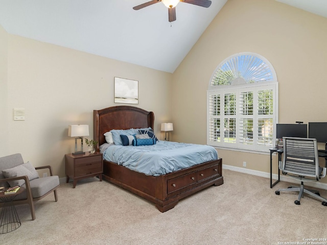 carpeted bedroom with high vaulted ceiling and ceiling fan