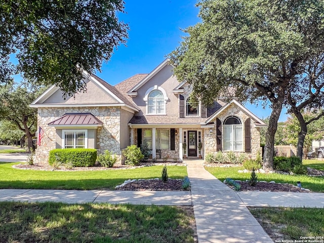 view of front of property with a front yard