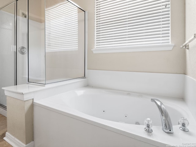 bathroom with independent shower and bath