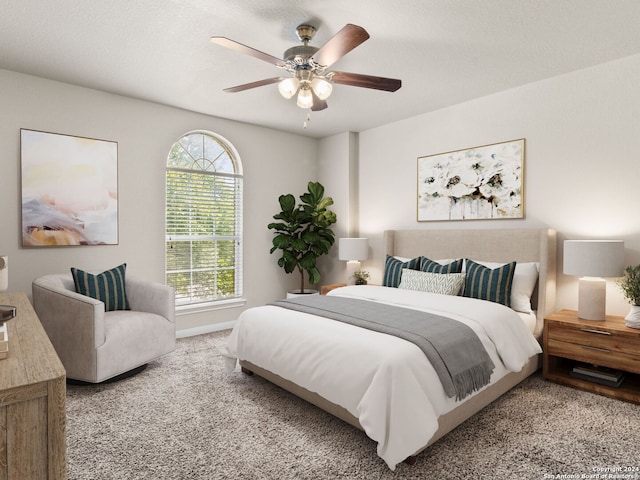 bedroom with ceiling fan and carpet