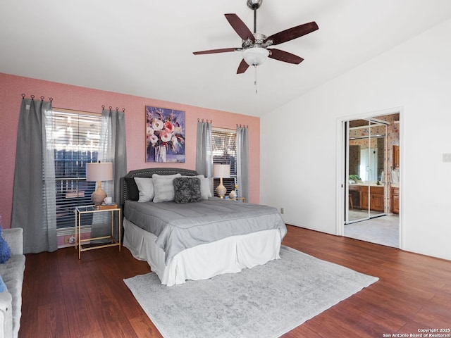 bedroom featuring lofted ceiling, dark hardwood / wood-style floors, and ceiling fan