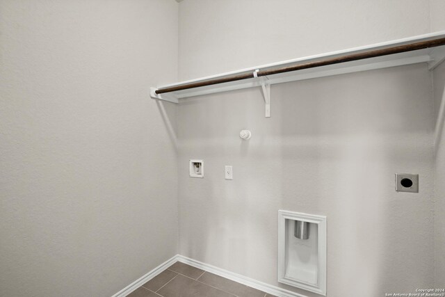 laundry room featuring tile patterned floors, hookup for a washing machine, hookup for an electric dryer, and gas dryer hookup