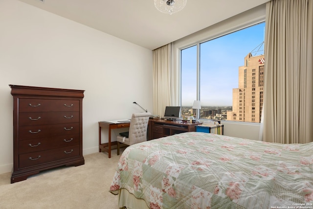 bedroom with light carpet