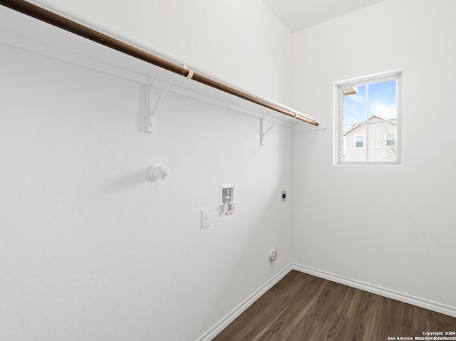 clothes washing area featuring electric dryer hookup, dark hardwood / wood-style flooring, and washer hookup