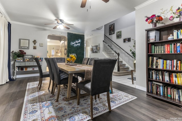 dining space featuring ceiling fan, hardwood / wood-style flooring, and ornamental molding