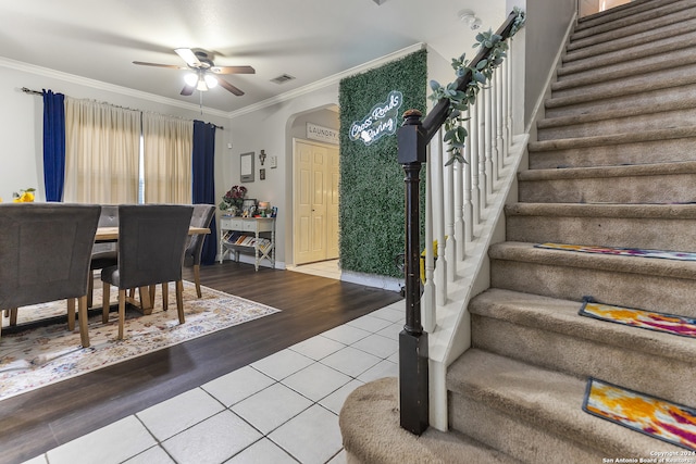 dining area with ornamental molding, hardwood / wood-style floors, and ceiling fan