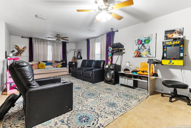 carpeted living room featuring ceiling fan