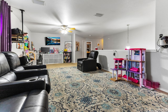 living room featuring ceiling fan