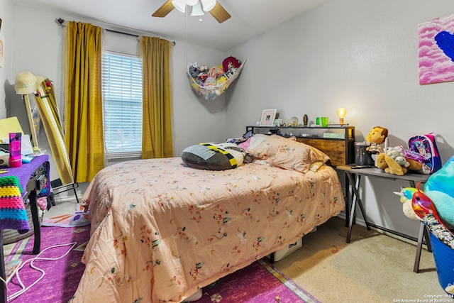 carpeted bedroom featuring ceiling fan