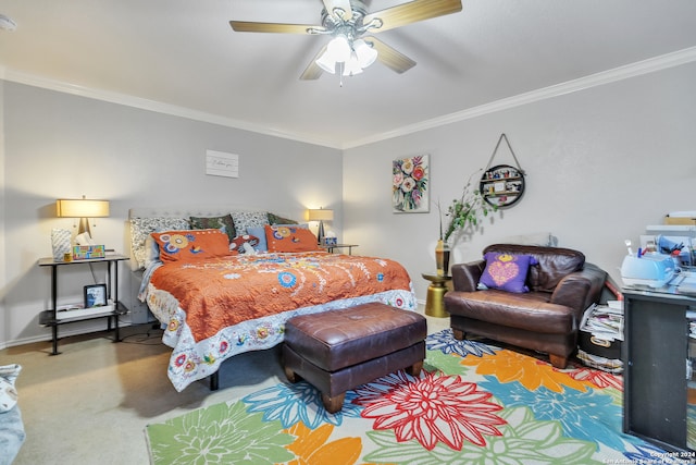 carpeted bedroom featuring ornamental molding and ceiling fan