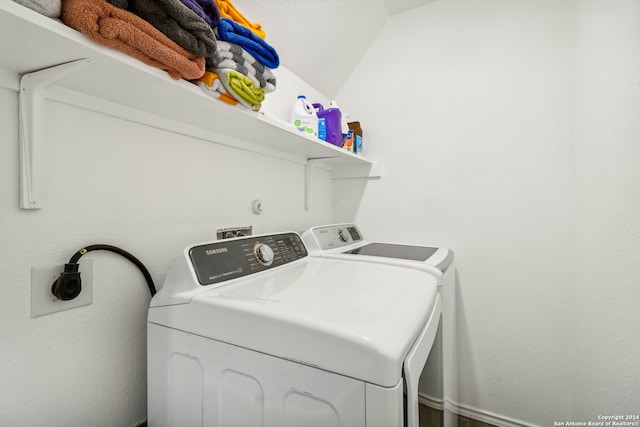 laundry room with washer and dryer