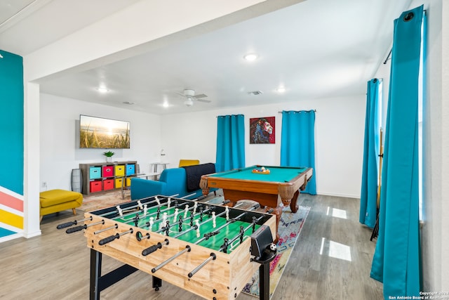 game room featuring hardwood / wood-style flooring, ceiling fan, and pool table