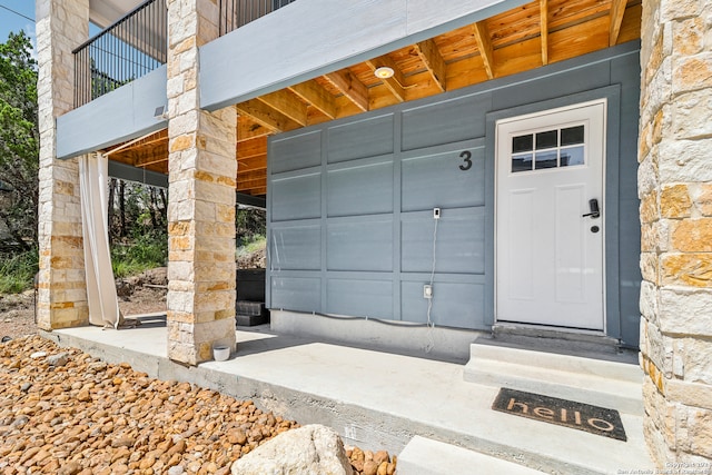 doorway to property with a balcony