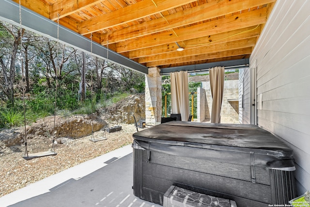 view of patio featuring a hot tub