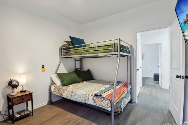 bedroom with wood-type flooring