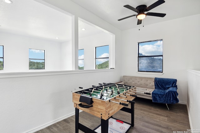 game room featuring hardwood / wood-style flooring and ceiling fan