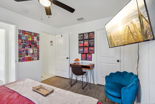 bedroom featuring ceiling fan and wood-type flooring