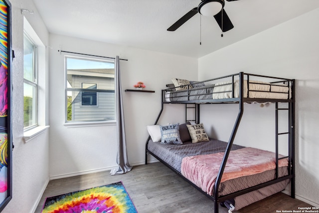 bedroom featuring ceiling fan and hardwood / wood-style floors