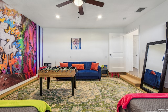 living room featuring ceiling fan