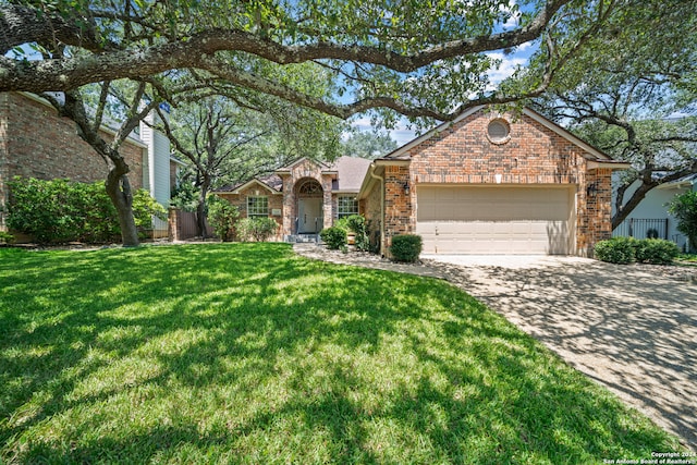 view of front facade with a front yard and a garage