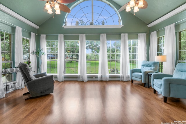 sunroom featuring ceiling fan and lofted ceiling