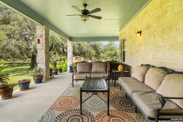 view of patio / terrace with ceiling fan and outdoor lounge area