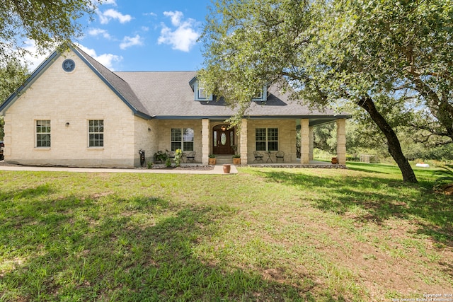 view of front of home with a front lawn