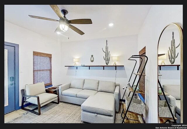 living room with ceiling fan