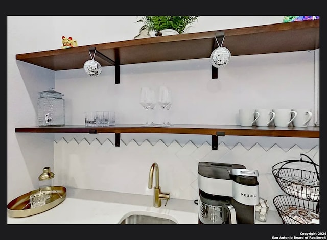 bar featuring sink