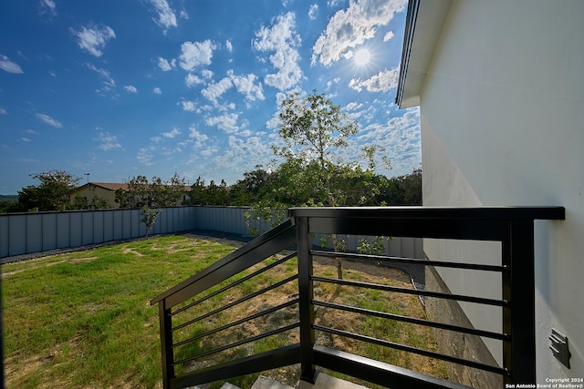 exterior space featuring a balcony