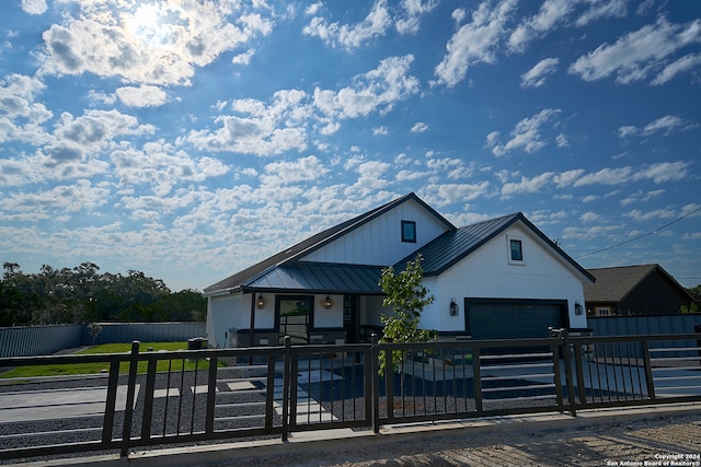 view of front of home with a garage