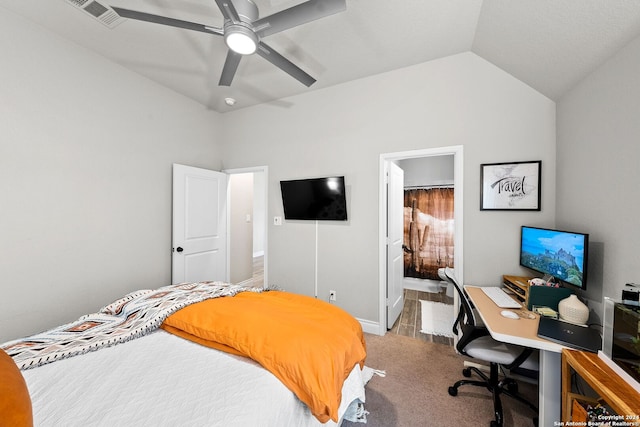 bedroom with ceiling fan, hardwood / wood-style floors, and lofted ceiling