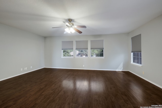 spare room featuring ceiling fan and wood-type flooring