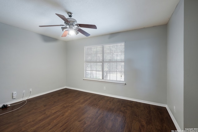 empty room featuring ceiling fan and wood-type flooring