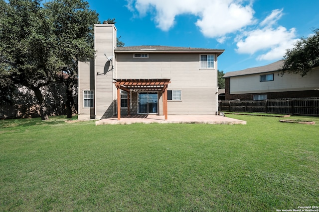 back of house featuring a patio, a pergola, and a yard