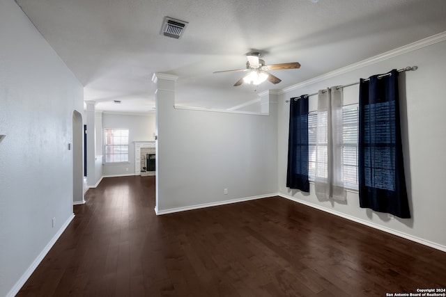 unfurnished room featuring ceiling fan, wood-type flooring, and crown molding