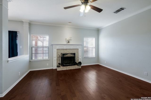 unfurnished living room featuring ceiling fan, crown molding, a fireplace, and hardwood / wood-style flooring