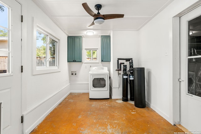 laundry room featuring ceiling fan, washer / clothes dryer, and cabinets