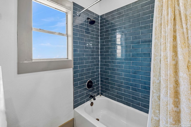 bathroom featuring shower / bath combo with shower curtain