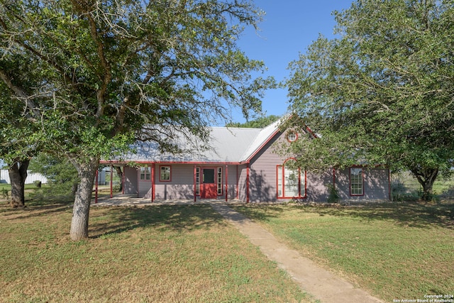 view of front of home with a front yard