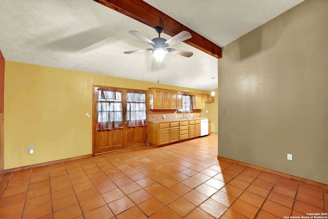 unfurnished room featuring beamed ceiling, a textured ceiling, light tile patterned floors, and ceiling fan